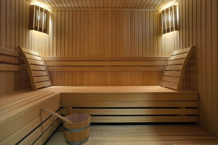 Interior of a hotel sauna, modern wooden design.