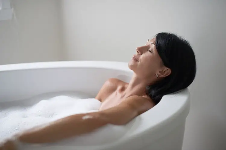 relaxing in a modern soaking tub