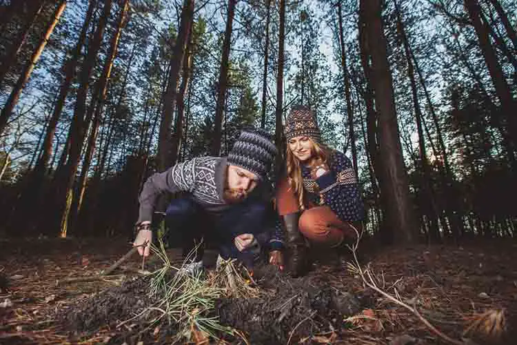 Couple tent camping in the wilderness