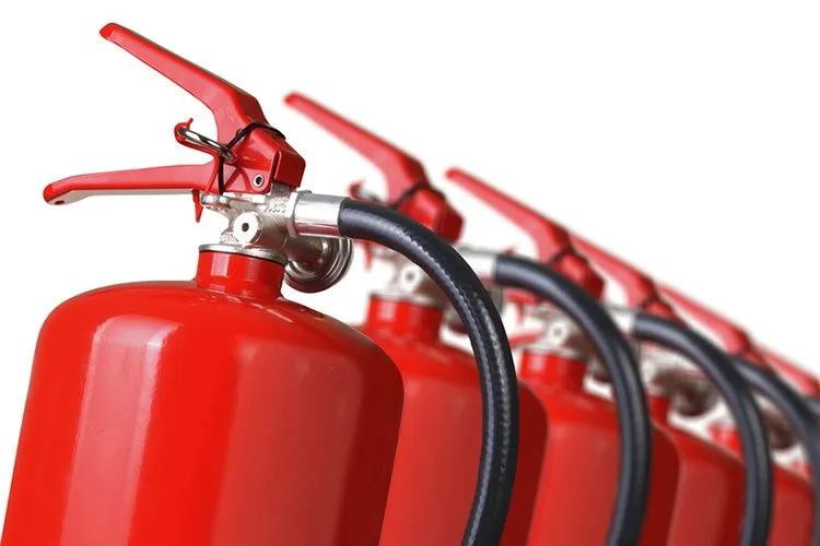 fire extinguishers close up isolated on white background