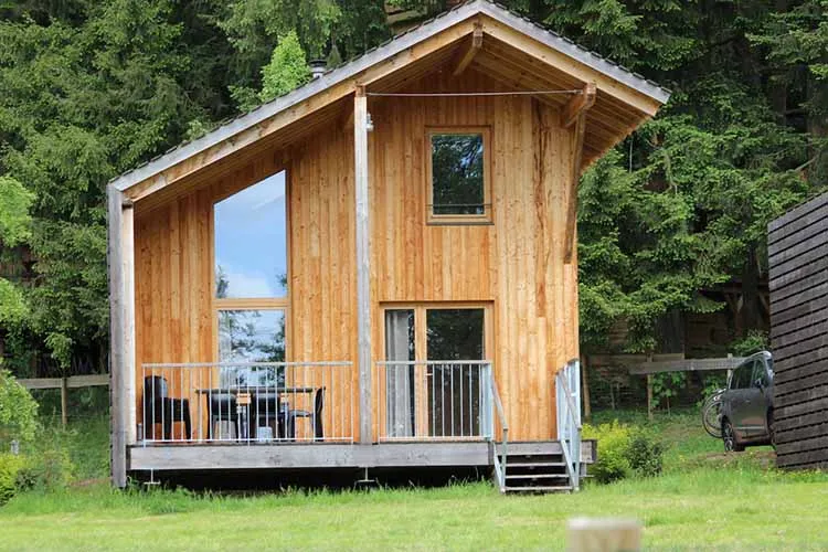 A modern log cabin in the mountains